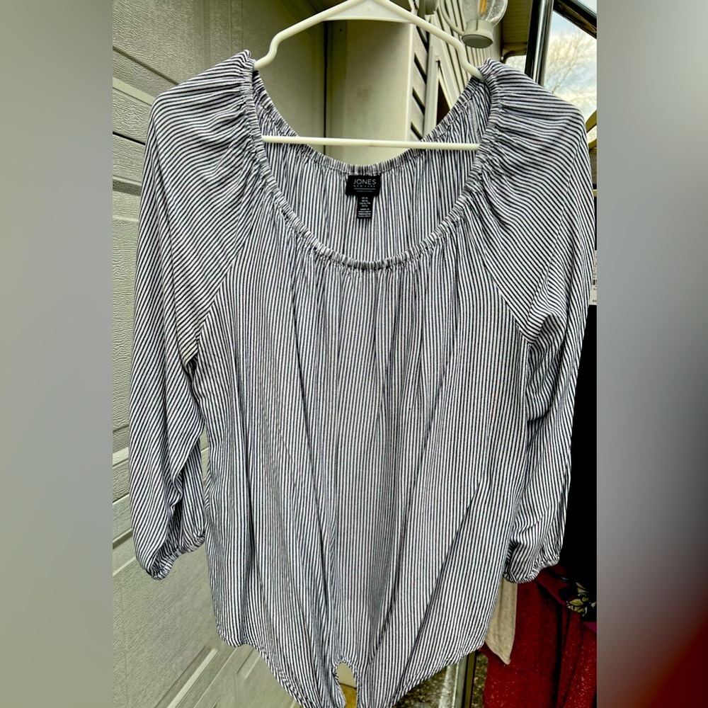 Woman’s off the shoulder striped shirt